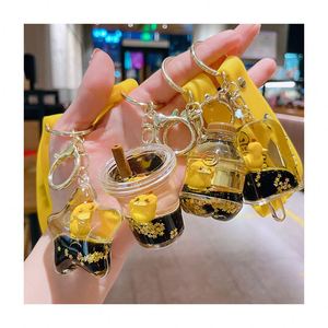 Porte-clés Pendentif Bouteille de Boisson en Forme de Canard de Dessin Animé, Thème Thé au Lait Flottant dans l'Huile, pour Sac à Main Femme et Voiture - Product Image 1