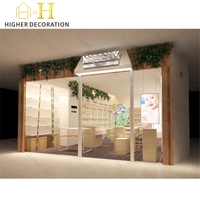 Vitrine de présentation cosmétique tendance personnalisée avec éclairage LED, présentoir pour parfums, pour la présentation de soins de la peau, aménagement intérieur de boutique de maquillage