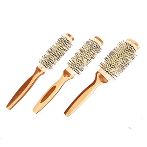 Brosse ronde en bambou à poils de sanglier ventilée pour salon, volumisante et bouclante, disponible en tailles grande, moyenne et petite - Product Image 4