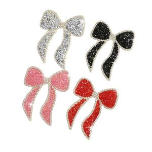 Nouvel empiècement nœud papillon brillant auto-adhésif en strass colorés pour la décoration de vêtements et sacs - Product Image 1