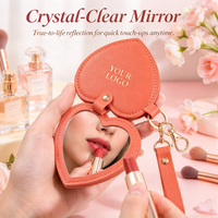 Porte-clés miroir en cuir PU en forme de cœur personnalisé, miroir de poche cosmétique portable avec logo personnalisé pour cadeau