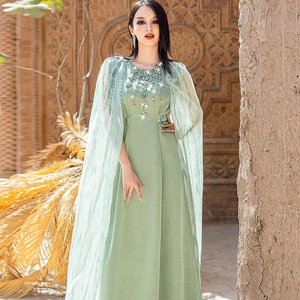 Роскошное платье цвета шалфейной зелени для VIP-мероприятий и гала-вечеров с дизайном в арабском стиле и накидкой. - Product Image 1