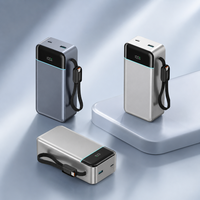 Batterie externe 65W 30000mAh USB-C, chargeur portable haute capacité avec câble intégré pour téléphone, tablette, ordinateur portable