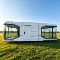 Hôtel modulaire de luxe moderne maison préfabriquée installation facile bateau-maison en verre étanche capsule spatiale de style design chinois