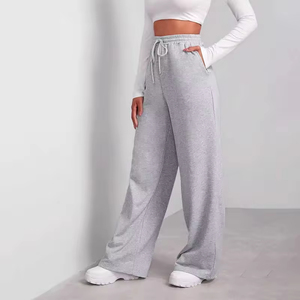 Pantalones de mujer con logo personalizado, cómodos, de pierna ancha, joggers de algodón polar, pantalones de chándal holgados con abertura lateral para entrenamiento - Product Image 1