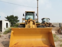 Chargeuse sur pneus Caterpillar 966G d'occasion prête à l'emploi, bras hydraulique puissant pour travaux de terrassement