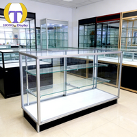 Vitrine de présentation haut de gamme en aluminium pour magasin de tabac, avec comptoir en verre trempé et éclairage LED, pour fournisseurs de matériaux bruts