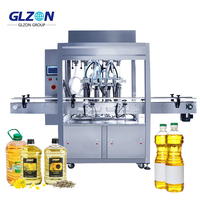 Machine de remplissage d'huile de cuisson |   Machine de remplissage de bouteilles d'huile semi-automatique |   Fournisseur de lignes d'emballage pour huiles d'olive, de palme et de noix de coco