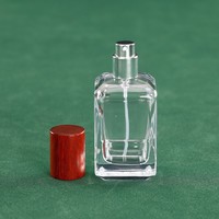 Vente en gros de flacons de parfum vides en verre transparent carré personnalisés de 30 ml avec vaporisateur et boîte d'emballage