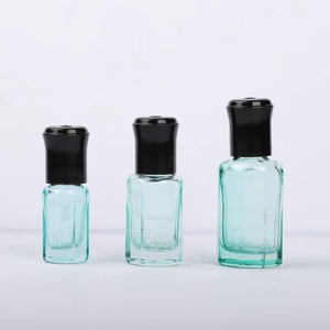 Wholesale in Stock 10ml Round Clear Surface Colorful Glass <b>Bottle</b> with Roll on for and <b>Plastic</b> Black Lid for Essential Oil - Product Image 1