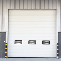 Porte sectionnelle industrielle motorisée avec batterie de secours, acier galvanisé double couche, isolation thermique élevée