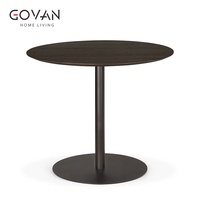 Table à manger ronde de la série Nordic en micro-ciment à finition mixte, idéale pour les salles à manger domestiques et les espaces commerciaux