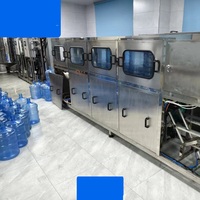 Machine de remplissage automatique d'eau en bouteille 100-120 barils/heure Ligne de production automatique d'eau potable de cinq gallons