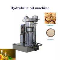 Presse hydraulique à froid pour l'extraction d'huile de beurre de cacao, de graines de sésame, de noix de coco, d'olive et d'avocat