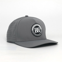 Casquette laser 5 panneaux à visière incurvée avec patch en caoutchouc et trous circulaires, très populaire