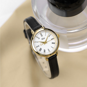 Montre ronde rétro pour femme, cadran à chiffres romains, bracelet en cuir polyvalent pour étudiants, montre-bracelet à quartz - Product Image 1
