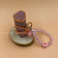Breloques uniques en forme de fleur et de nœud, perles acryliques assorties, flacon de parfum de voyage de 15 ml, mini flacon pulvérisateur de parfum porte-clés