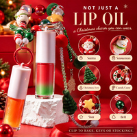 Huile à lèvres bicolore de Noël sous marque privée, avec breloque perlée, brillance intense, hydratante, jojoba, vitamine E, gloss à lèvres en gros