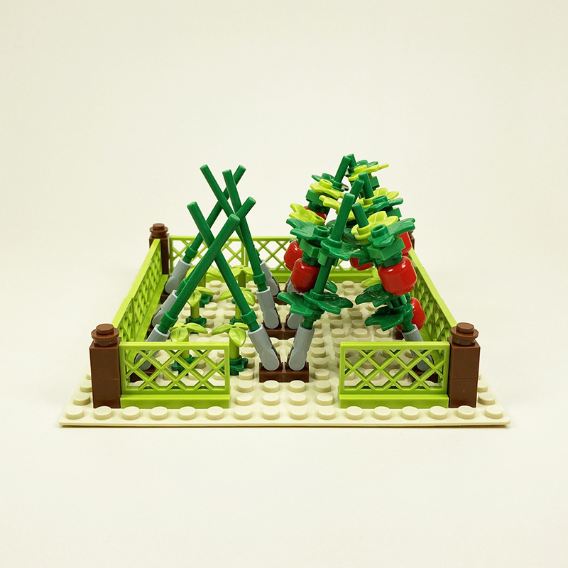 Tomato garden with paper drawings