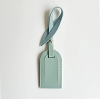 Étiquette de bagage en cuir PU lisse anti-perte pour sacs à dos et valises de voyage, accessoire de charme, vente chaude