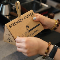Luxuriöse Dreieckige Kaffee-Geschenkbox mit Bandgriff Tragbarer Kraftpapier-Aufbewahrungsbehälter mit Leicht-Aufreiß-Verschluss (100g/180g/350g)