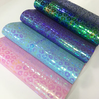 Cuir PU léopard laser gaufré effet miroir, épaisseur 0,7 mm, résistant à l'abrasion, avec fond en laine, couleur magique, vente en gros usine
