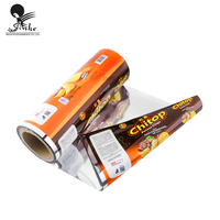 Film laminé PE PET rouleau de film plastique personnalisé bouffée de bonbon alimentaire banane croustilles rouleau de film d'emballage alimentaire pour emballage alimentaire
