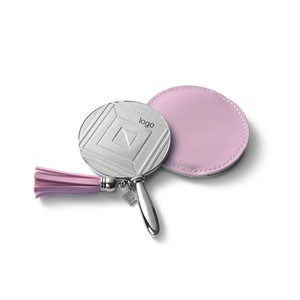 Espejo de Maquillaje Redondo y Pequeño de Cuero Rosa con Logotipo Personalizado, Asa de Metal Grabada y Borla - Product Image 1