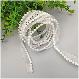 Couture de perle dentelle d'organza de neige avec