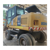 Excavatrice sur pneus Komatsu PW150-7 d'occasion, 15 tonnes, haute performance, engin de construction avec boîte de vitesses et pompe, prix avantageux