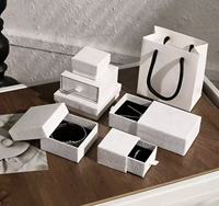 Boîte d'emballage pour bijoux en carton blanc tricotée à la main avec doublure en éponge/EVA, luxe léger, haut de gamme, boîte en deux parties
