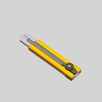 Couteau utilitaire robuste avec lame de 25 mm de large, verrouillage par bouton, revêtement en caoutchouc