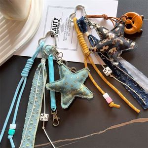 Llavero de Cuero de Lujo Ligero con Estrella de Cinco Puntas, Accesorio para Bolso, Colgante Creativo con Cuerda Trenzada - Product Image 1