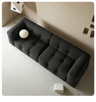 Canapé Sherpa Bubble surdimensionné 4 places, design capitonné en grille, tissu ultra doux et moelleux, mobilier moderne pour salon
