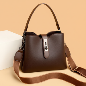 Brown Handbag. Bucket style with a bold fabric strap and silver lock. Available at wholesale prices - Product Image 1