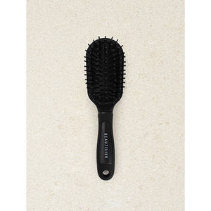 Mini brosse à pagaie ovale Logo personnalisé style ionique démêlant manche ABS rembourré évent en nylon matière plastique pour une utilisation en salon - Product Image 1