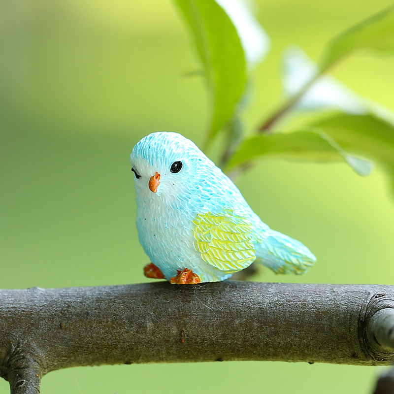 colorful A blue bird turning its head