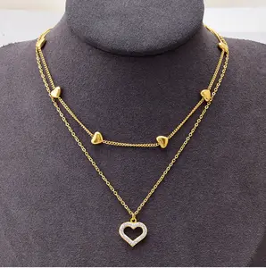 Nouvelle arrivée mode évidé pendentif coeur en diamant avec collier à breloques en acier inoxydable double couche KN2305256