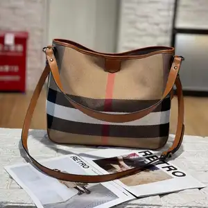 2023 Hochwertige Plaid Leder Damen Tasche Mode ausländischer Stil Eimerbeutel Kuh Leder Bote-Handtaschen