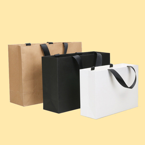 Bolsas de papel kraft con logotipo personalizado para tiendas de ropa, publicidad empresarial, bolsas de papel para regalos al por mayor - Product Image 1