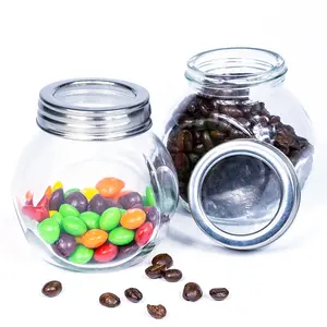 Kitchen Glass bottle manufacturer wholesales jams candies spices with metal lids mini flat glass Foof jars & bottles