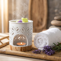 Brûleur d'huiles essentielles en céramique blanche de luxe, motif floral ajouré, support de bougie chauffe-plat, diffuseur de cire aromatique pour la décoration intérieure