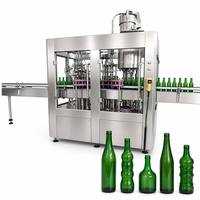 Machine de remplissage de bière entièrement automatique 3 en 1 à longue durée de vie, équipement d'embouteillage pour bouteilles en verre pour ligne de production industrielle de bière