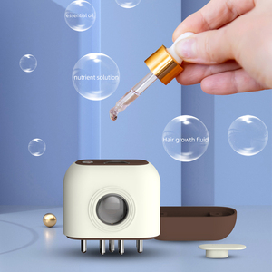 Brosse de massage électrique 2-en-1 pour le cuir chevelu avec applicateur d'huile capillaire et lumière rouge et bleue ciblée pour la croissance des cheveux et l'application sur la tête - Product Image 3