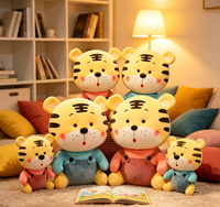Peluche tigre de dessin animé personnalisée OEM ODM, peluche tigre douce avec salopette, logo personnalisé pour cadeau enfant et décoration intérieure