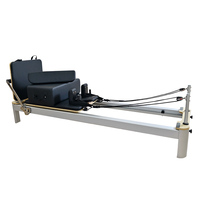 Réformateur de Pilates en aluminium de studio blanc noir argenté personnalisé comprend une rallonge de boîte de siège sangles à double boucle