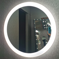 Miroir rond au design moderne avec rétroéclairage LED intelligent anti-buée, miroir de salle de bain intelligent à LED avec écran tactile pour hôtel