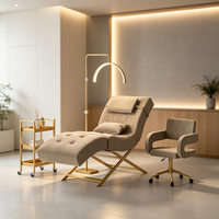 Lit de beauté moderne en tissu rouge pour salon, base dorée de luxe, mobilier de salon, lit cosmétique pour cils avec chariot