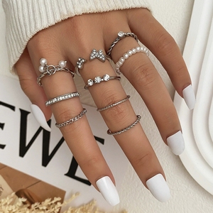 Ensemble de 9 bagues de style royal avec diamants, feuilles de cristal, cœur, papillon, vague, étoile, serpent, perle - Product Image 3