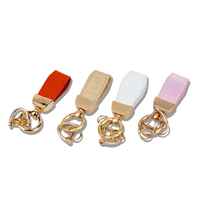 Porte-clés en cuir gaufré de luxe pour clés de voiture de luxe avec design personnalisé et détails en feuille d'argent Cadeau